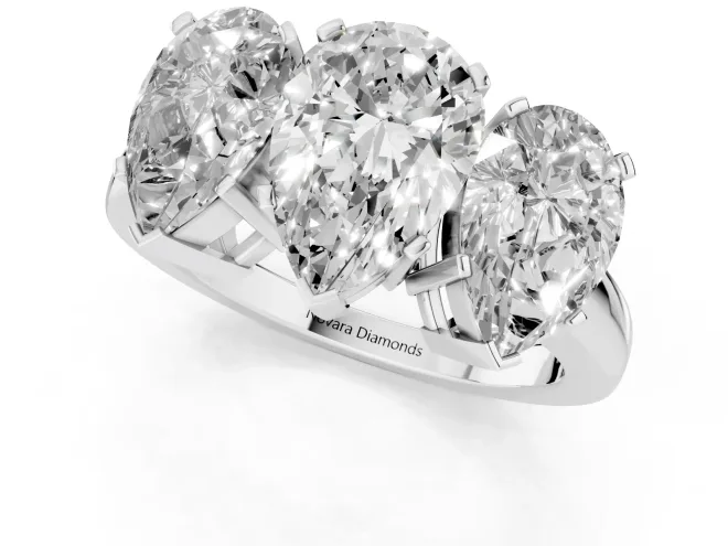 Pear Cut Diamond Three-Stone Ring Set in Platinum with Channel-Set Band and Prong Settings – second view