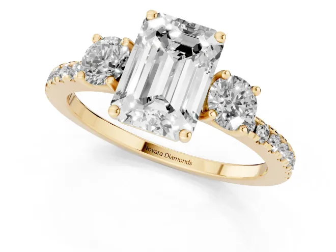 Emerald Cut Diamond Three-Stone Ring Set in Yellow gold with Pavé Band and Graduated Sides – second view