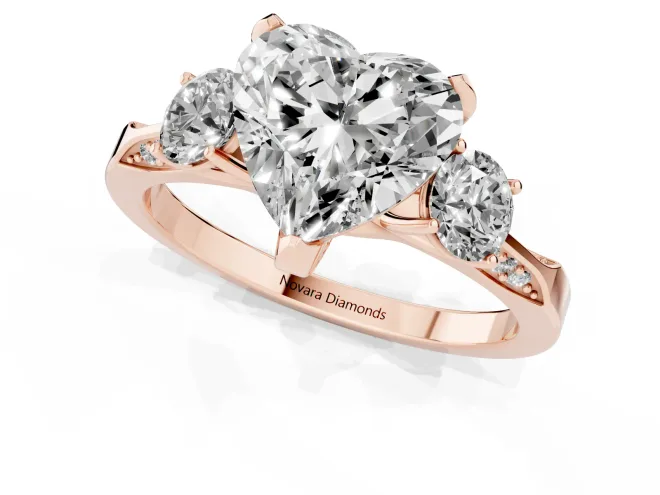 Heart Cut Diamond Three-Stone Ring Set in Rose gold with Pavé Band and Smaller Side Stones – second view
