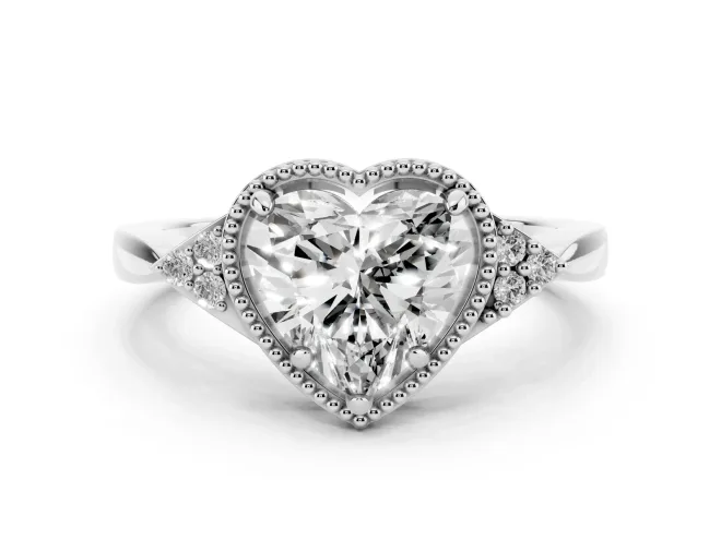 Heart Cut Diamond Milgrain Solitaire Ring Set in White gold with Tapered Pavé Band and Prong Setting