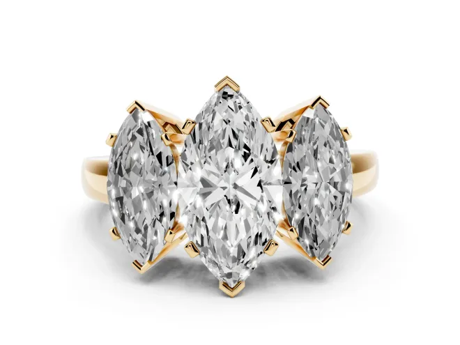 Marquise Cut Diamond Three-Stone Ring Set in Yellow gold with Channel-Set Band and Prong Settings