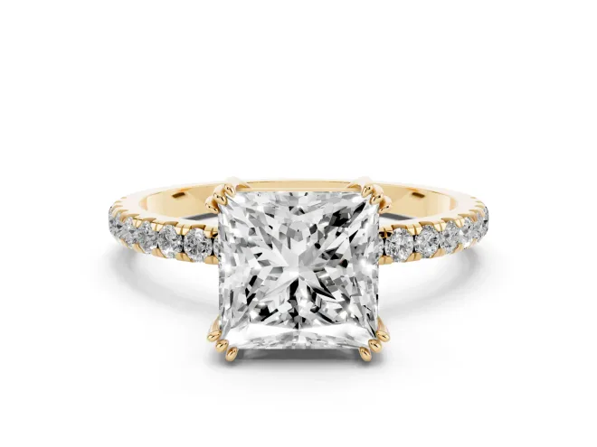 Princess Cut Diamond Brilliant Solitaire Set in Yellow gold with Pavé Band and Claw Prong Setting