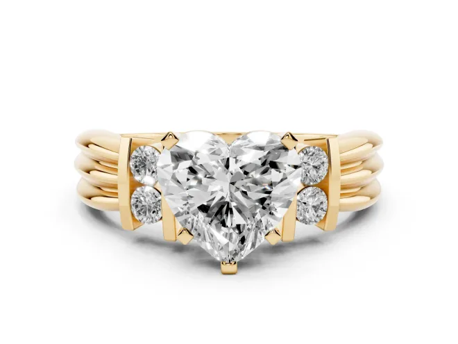 Three-Stone Heart Cut Diamond Channel Set Ring Set in Yellow gold with Bar Prongs