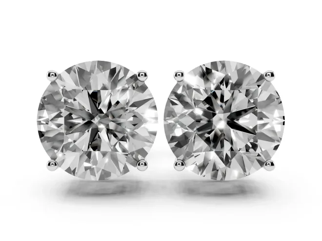 Round Cut Diamond Solitaire Stud Earrings Set in White gold with Basket Setting
