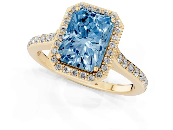 Fancy Blue Radiant Cut Diamond Halo Engagement Ring Set in Yellow gold with Round Pavé Shoulders and Heart Gallery – second view