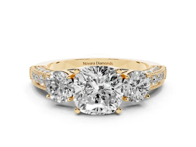 Cushion Cut Diamond Three-Stone Ring Set in Yellow gold with Round Side Stones and Pavé Band
