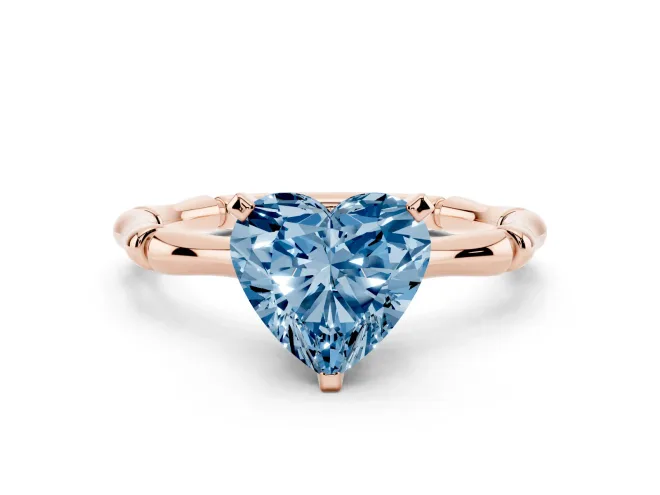 Fancy Blue Heart Cut Diamond Solitaire Ring Set in Rose gold with Bamboo Band and Prong Setting