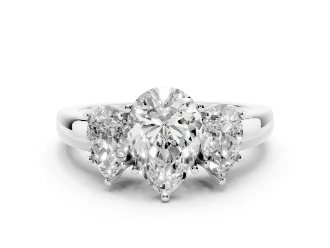 Pear Cut Diamond Three-Stone Ring Set in White gold with Bold Center and Classic Band