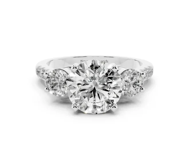 Three-Stone Round Cut Diamond Pavé Band Ring Set in White gold with Prong-Set Trio