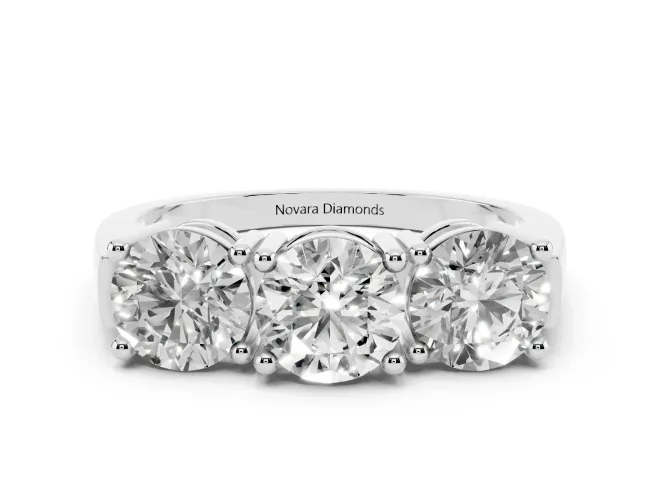 Round Cut Diamond Three-Stone Ring Set in White gold with Channel Band and Sturdy Prongs