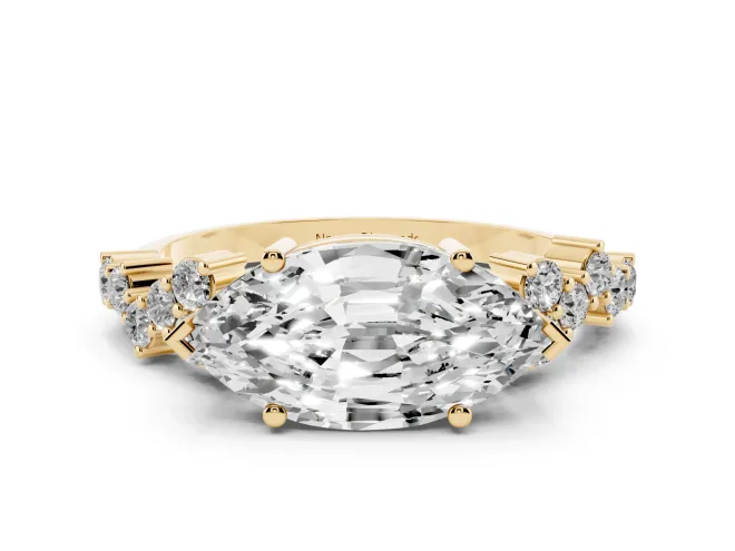 Marquise Cut Diamond Ring Set in Yellow gold with Scattered Round Accents