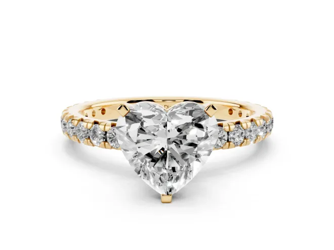 Heart Cut Diamond Pavé Solitaire Ring Set in Yellow gold with Round Band and Prong Setting