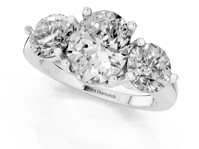 Oval Cut Diamond Three-Stone Ring Set in White gold with Prong Setting and Classic Band – second view