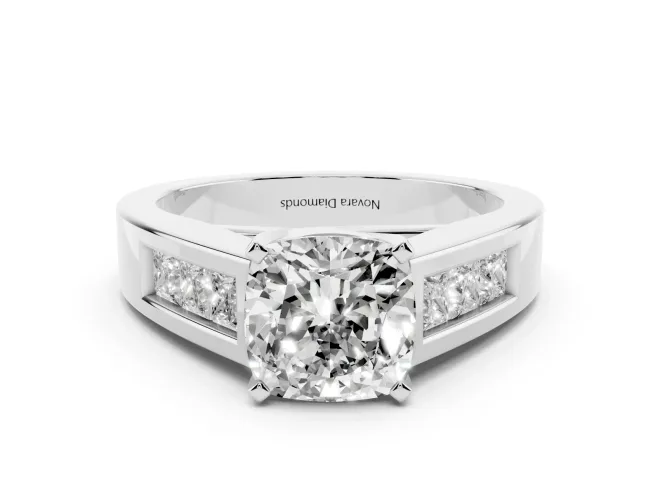 Cushion Cut Diamond Solitaire Ring Set in Platinum with Channel-Set Accent Stones and Prong Setting