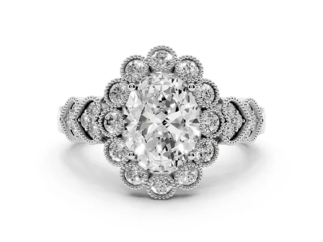 Oval Cut Diamond Solitaire Ring Set in Platinum with Milgrain Pavé Heart Band