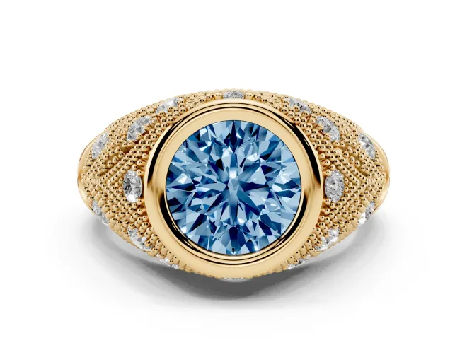 Fancy Blue Round Cut Diamond Bezel Ring Set in Yellow gold with Milgrain Accent Band