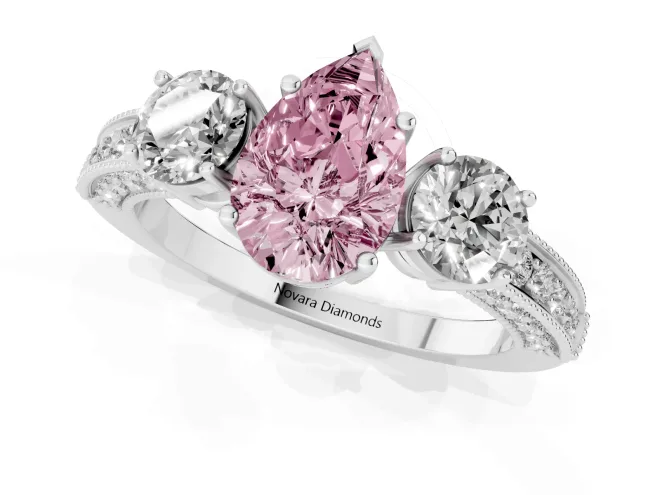 Fancy Pink Pear Cut Diamond Three-Stone Ring Set in White gold with Round Side Stones and Pavé Band – second view