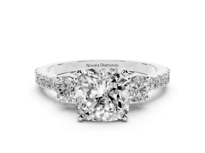 Three-Stone Cushion Cut Diamond Pavé Band Ring Set in Platinum with Prong Setting