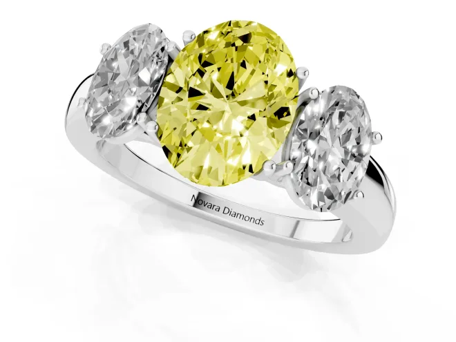 Fancy Yellow Oval Cut Diamond Three-Stone Ring Set in Silver with Bold Center and Classic Band – second view