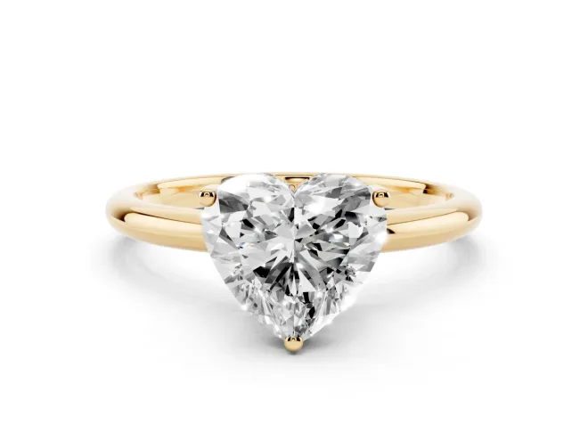 Heart Cut Diamond Solitaire Engagement Ring Set in Yellow gold with Prong Setting and Polished Band