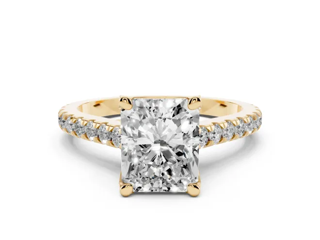 Radiant Cut Diamond Solitaire Ring Set in Yellow gold with Brilliant Pavé Band and Prong Setting