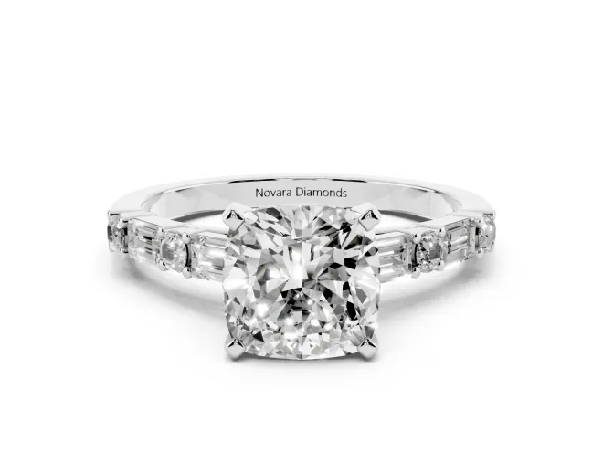 Cushion Cut Diamond Solitaire Set in White gold with Side Baguettes and Channel Set Band