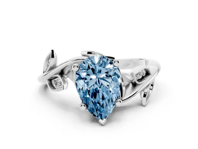 Fancy Blue Pear Cut Diamond Solitaire Twist Engagement Ring Set in White gold with Pavé Leaf Accents