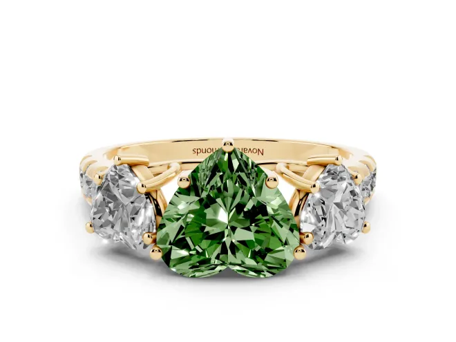 Fancy Green Heart Cut Diamond Three-Stone Ring Set in Yellow gold with Pavé Band