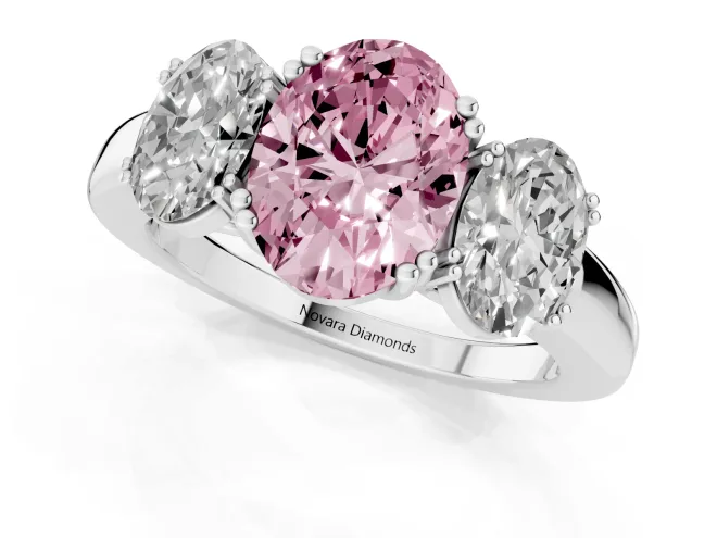 Fancy Pink Oval Cut Diamond Three-Stone Ring Set in White gold with Polished Band and Prong Setting – second view
