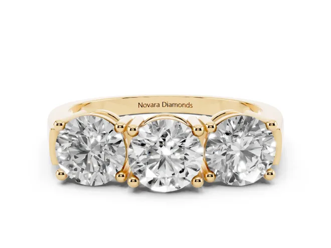 Round Cut Diamond Three-Stone Ring Set in Yellow gold with Channel Band and Sturdy Prongs
