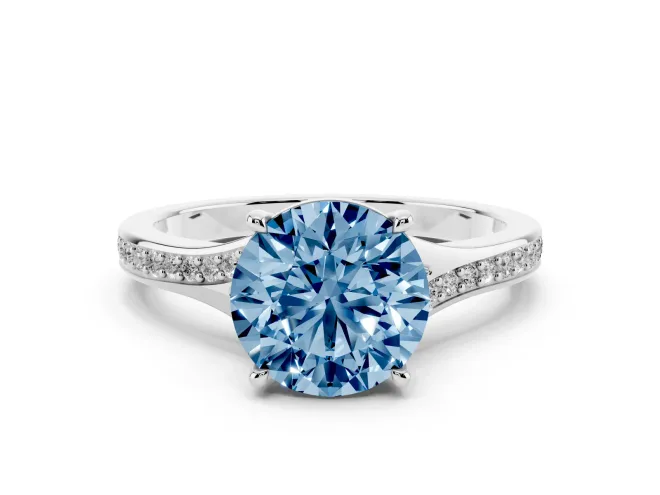 Fancy Blue Round Cut Diamond Solitaire Ring Set in Silver with Pavé Accent Band and Classic Prong Setting