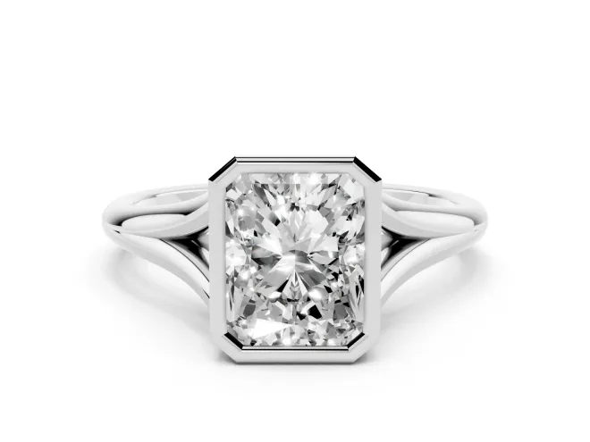 Bezel Set Radiant Cut Diamond Solitaire Ring Set in White gold with Tapered Band