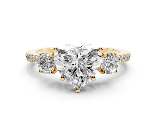 Heart Cut Diamond Three-Stone Ring Set in Yellow gold with Pavé Band and Graduated Sides