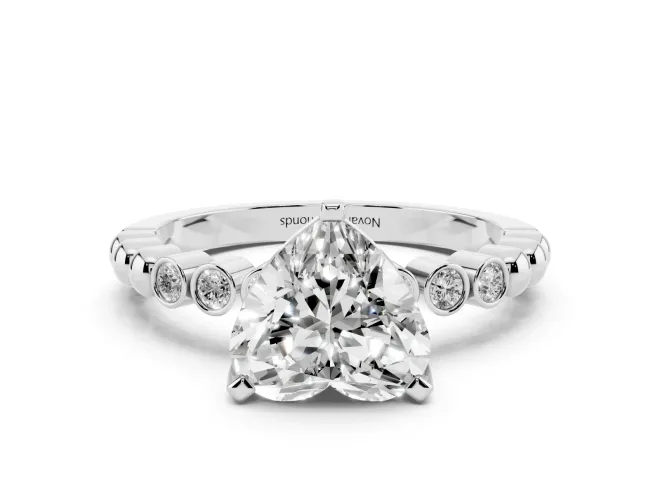 Heart Cut Diamond Solitaire Engagement Ring Set in Silver with Bezel Accents on Beaded Band