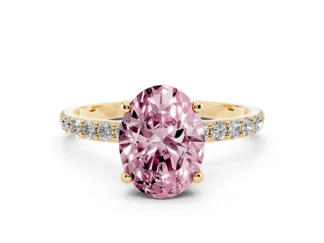 Fancy Pink Oval Cut Diamond Solitaire Ring Set in Yellow gold with Round Pavé Band and Prong Setting
