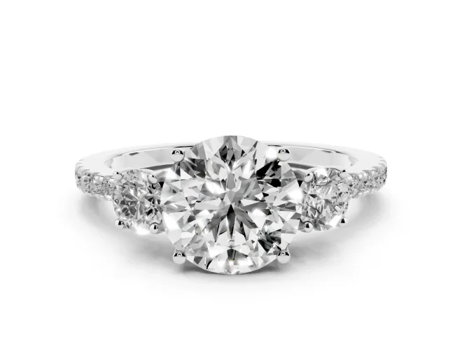 Round Cut Diamond Three-Stone Ring Set in Silver with Pavé Band and Graduated Sides