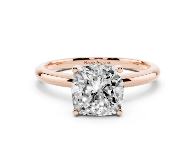 Cushion Cut Diamond Solitaire Engagement Ring Set in Rose gold with Prong Setting and Polished Band