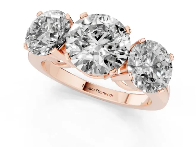 Round Cut Diamond Three-Stone Ring Set in Rose gold with Channel-Set Band and Prong Settings – second view