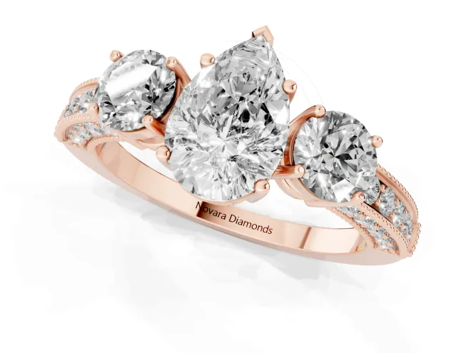 Pear Cut Diamond Three-Stone Ring Set in Rose gold with Round Side Stones and Pavé Band – second view