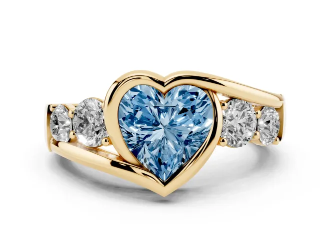 Fancy Blue Heart Cut Diamond Bezel Bypass Ring Set in Yellow gold with Round Accents