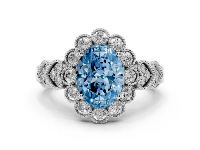 Fancy Blue Oval Cut Diamond Solitaire Ring Set in Platinum with Milgrain Pavé Heart Band