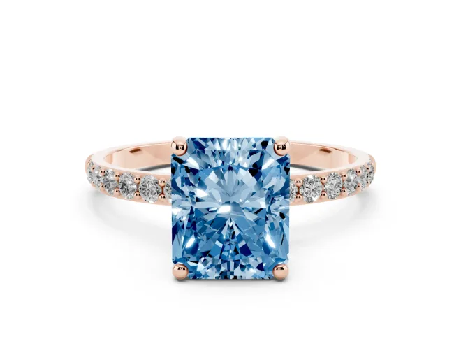Fancy Blue Radiant Cut Diamond Solitaire Ring Set in Rose gold with Round Pavé Band and Prong Setting