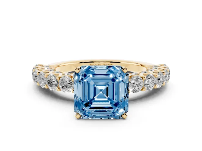 Fancy Blue Asscher Cut Diamond Solitaire Ring Set in Yellow gold with Shared Prong Pavé Band