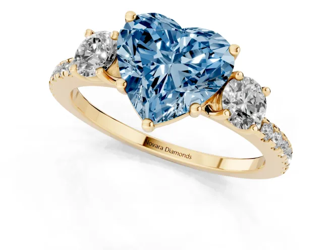 Fancy Blue Heart Cut Diamond Three-Stone Ring Set in Yellow gold with Pavé Band and Graduated Sides – second view
