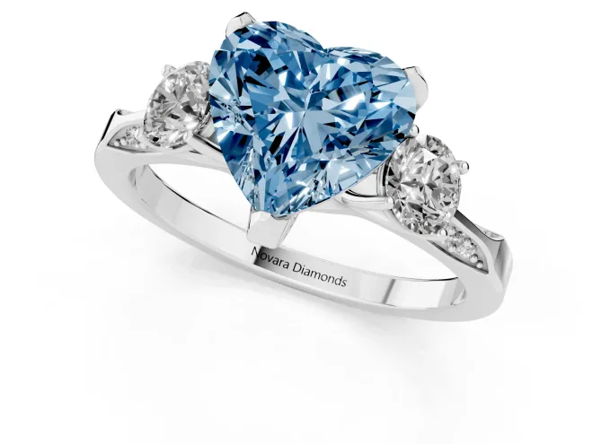 Fancy Blue Heart Cut Diamond Three-Stone Ring Set in White gold with Pavé Band and Smaller Side Stones – second view