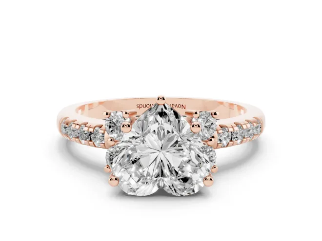 Heart Cut Diamond Three-Stone Pavé Ring Set in Rose gold with Prong Setting