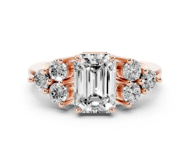 Emerald Cut Diamond Solitaire Ring Set in Rose gold with Cluster Accents on Each Side