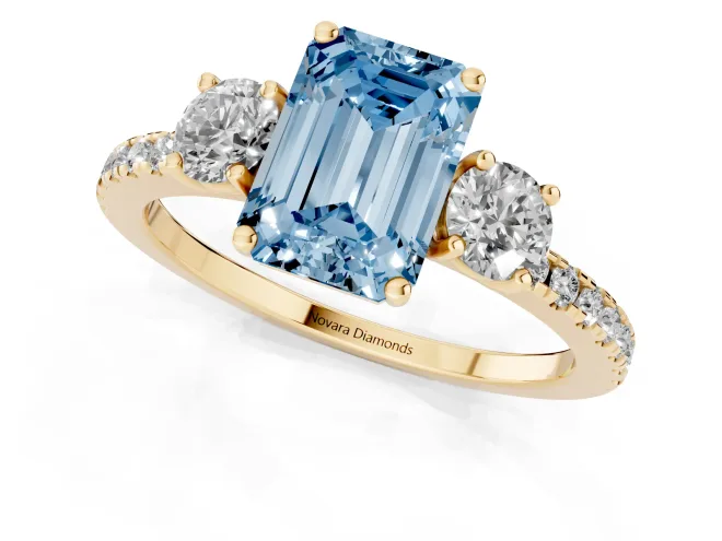 Fancy Blue Emerald Cut Diamond Three-Stone Ring Set in Yellow gold with Pavé Band and Graduated Sides – second view
