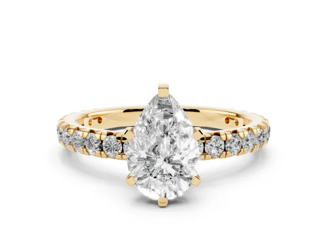 Pear Cut Diamond Pavé Solitaire Ring Set in Yellow gold with Round Band and Prong Setting