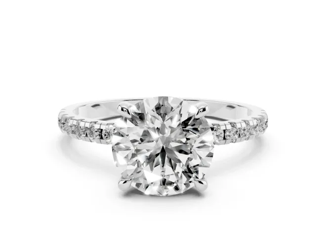 Round Cut Diamond Brilliant Solitaire Ring Set in Platinum with Pavé Band and Prong Setting